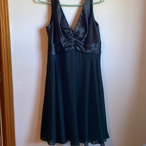 Petra purchased at Ann Taylor. Cute black dress